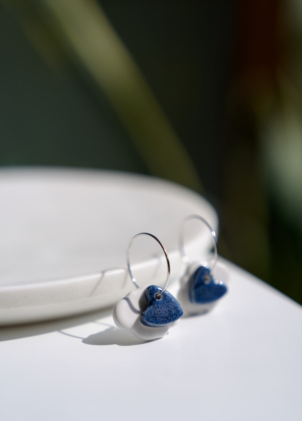 Orecchinin Sisu Nunchi duo silver Creative Bloom ceramiche e gioielli con un'anima mantra da indossare